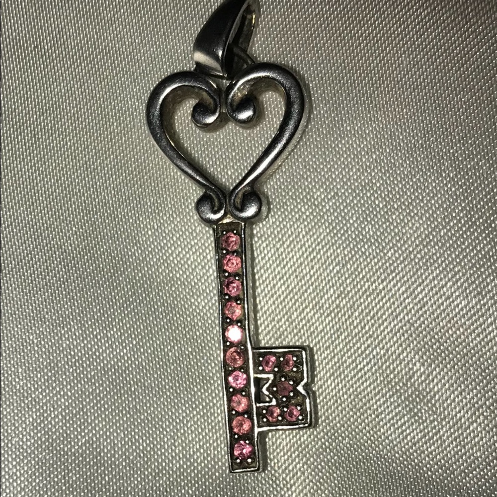 Kay jeweler pink Sapphire sterling silver .65 key